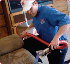 Operator Cleaning Upholstery